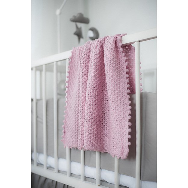 Pink soft knitted woolen blanket
