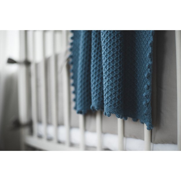 Dark blue soft knitted woolen blanket
